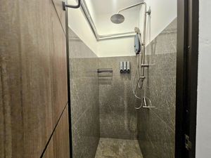 Bed in 4-Bed Female Dormitory Room with rainshower room with toiletries at Ubuntu Live Boutique Hostel & Rooms in Phuket