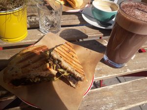 Vegan cheese + mushroom sandwich and hot chocolate with oat milk at KIRAS - Totoriu 7 in Vilnius