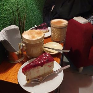 Cranberry mousse, chaï lattes and blueberry cheesecake at KIRAS - Totoriu 7 in Vilnius