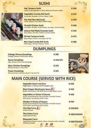 Sushi, dumplings, and main courses with marked veg options at Ginger Restaurant in Serrekunda