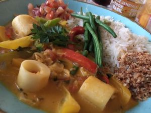 MOQUECA DE PALMITOS Butternut squash, palm hearts & spinach in a creamy coconut curry with charred red peppers, garlic & fresh tomatoes. With spring onion rice, sweet plantain, pico de gallo & a coconut farofa to sprinkle at Las Iguanas in Newcastle Upon Tyne