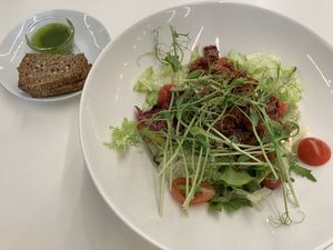 Salads with dry tomatoes, olives and sesame seeds  at Ajurvedine Virtuve in Vilnius
