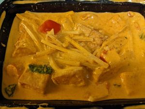 Red Coconut Curry at Thai Meal in Plantation
