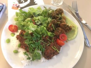 lentil curry, rice, salad and broccoli of the gods!  at Roots Kitchen in Turku