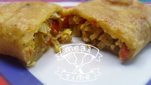 This is a typical food from here called in Guarani (our second language) Pastel Mandi´o, is an empanada made with yuka, the traditional way is to fill it with meat, but we use vegetables or soy :) at Pink Cow in Asuncion