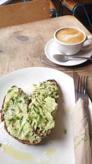 Avadaco toast and flat white at The Plant Cafe in Exeter