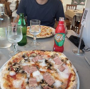 Speck pizza & the Austrian sausage and patatine pizza  at Il Papiro in Milan