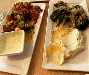 Radical cauliflower wings with ranch style dip, brave broccoli with cashew cheese at Pure Kitchen - Richmond Rd in Ottawa