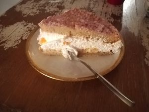 Tangerine cake with pink glitter at Veganalina in Hamm