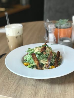 Caesar with vegan bacon and iced soy latte.  at Green Pumpkin in Riga