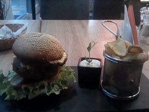 Hawaiian burger with cheese, mayo and wedges at Green Pumpkin in Riga