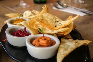 hummus selection with garlic bread at Green Pumpkin in Riga