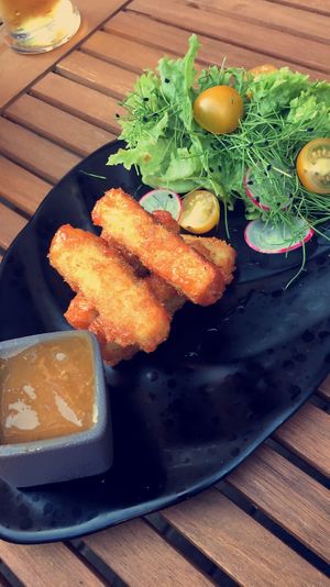 Starter - tofu fingers, sweetchili sauce and side salad. at Green Pumpkin in Riga