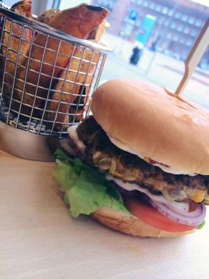 THE best vegan burger in town! Served with truffle oil wedges. Try and you will be hooked. at Green Pumpkin in Riga