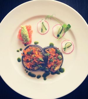 Aubergine with carrot sautée, pesto, guacamole. at Green Pumpkin in Riga