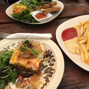 Vegan moussaka (bottom), harvest breakfast (top), fries with vegan aioli (right) at The Shroom Room in Christchurch