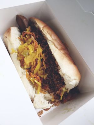 Vegan hot dog with amazing toppings! at Le Tricycle in Paris