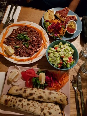 Bean salad, green salad, turkish pizza (bottom) and quesadilla (top) at Veganka in Ankara