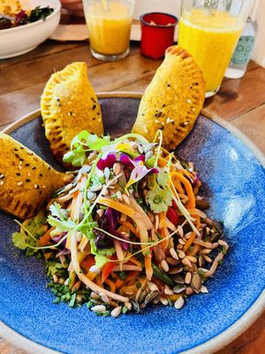 Plate of the day and juices. Mango/vanilla/passion fruit. And passion fruit/chamomile/cane syrup . at Org Bistro in Rio De Janeiro