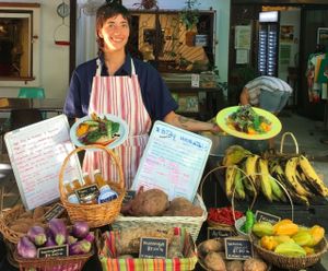 owner Tara and some crops! at El Departmento de la Comida in San Juan