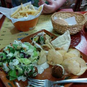 Falafel plate and a side of french fries at Falafel Nessya in Playa Del Carmen