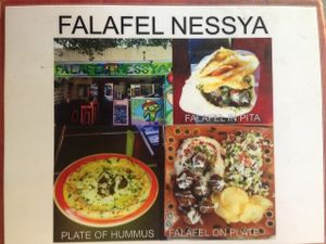 Front side of Menu at Falafel Nessya in Playa Del Carmen