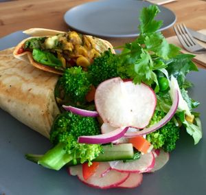 Corn fritter wrap with salad (Vegan) at Little River in Brunswick