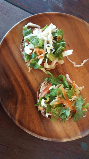 Rye bread toast with hummus and salad at Akasha Home Restaurant in Koh Phangan
