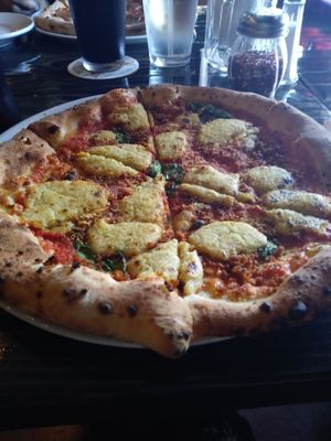 Baba with added vegan sausage. at Pizzeoli in St Louis