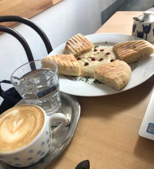 Hummus with pita and soy cappuccino at Mamacoffee in Prague