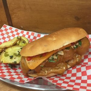meatball sub with vegan cheese + chips  at Bolero Meatball in Madrid