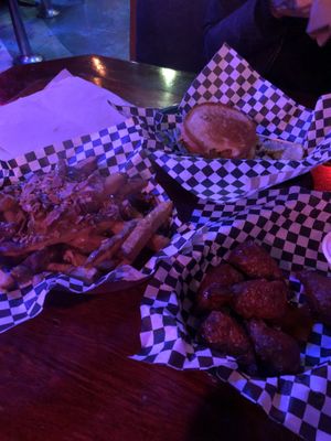 Load fries, wings and their version of a BLT  at Le Voyeur in Olympia