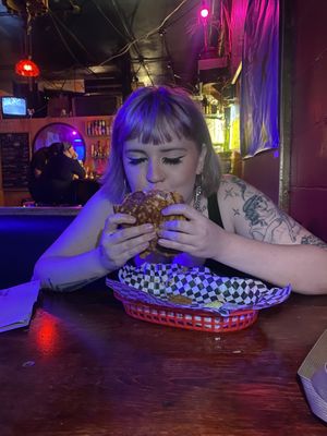 me eating the melty melt. I love this placee  at Le Voyeur in Olympia