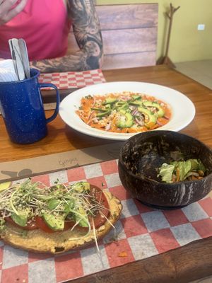 Hummus toast w side salad, red chilaquiles   at La Cuisine in Cozumel