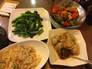 Dumplings, monkey head mushroom dish, seasonal green vegetable and rice dish at Veggie Family 素食一家 in Kowloon
