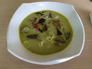 Don't miss their thai green curry.  Served with a side of rice this curry is packed with egg plant, scrumptious tofu, an array of spices and more. (Menu #43) at Clover 8 in East Singapore