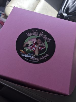 4 or more in a box, otherwise in a bag. at Sticky Fingers Baking Company in Ventura