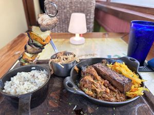 Vegan bbq platter with risotto the Mac n cheese is made with cashew fyi  at Yemanja Woodfired Grill in Oranjestad