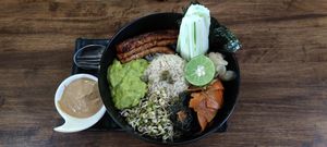 Sushi bowl (sprouts, carrot 'sushi', avocado, tempeh, seaweed, pickled ginger, cucumber) at Eat.Co in Koh Phangan