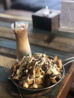 Cheesy Kebab Chip Bomb with Iced Coffee at Eat.Co in Koh Phangan