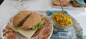 The "Gigiburger" and scrambled tofu. at Les Delices De Gigi in Le Perreux