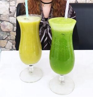The "Green" (Kiwi, apple and basil) and "Vert" (kiwi, spinach, basil and apple) juices/smoothies. at Les Delices De Gigi in Le Perreux