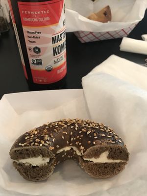 Black Russian bagel w vegan cream cheese and kombucha  at Ruthie's Bagel Dish in Highland Park