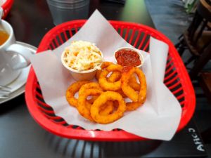 Onion rings and coleslaw at Belzepub in Prague