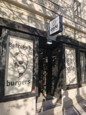 Don't be confused: This is how it looks from the outside. The pub is downstairs. Upstairs is a café and plant shop. The outside seating does not belong to the pub. at Belzepub in Prague