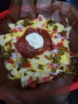 blurry loaded nachos at Belzepub in Prague