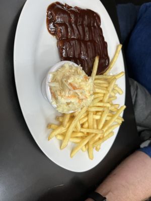 No ribs with fries and homemade coleslaw. All delicious.   at Belzepub in Prague