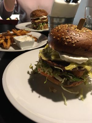 Swiss burger, fries, Tyrol burger at Belzepub in Prague