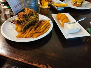 Hotdog and jalapeño poppers at Belzepub in Prague