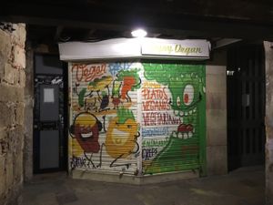 outside after hours at Enjoy Vegan in Barcelona